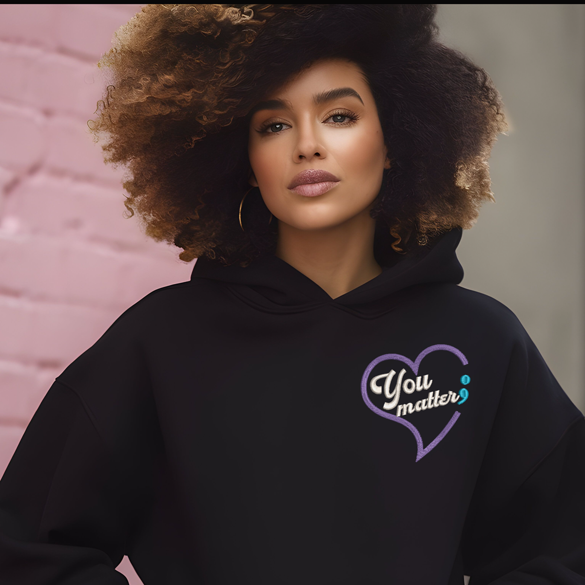 black hoodie with "You Matter" mental health semicolon embroidery