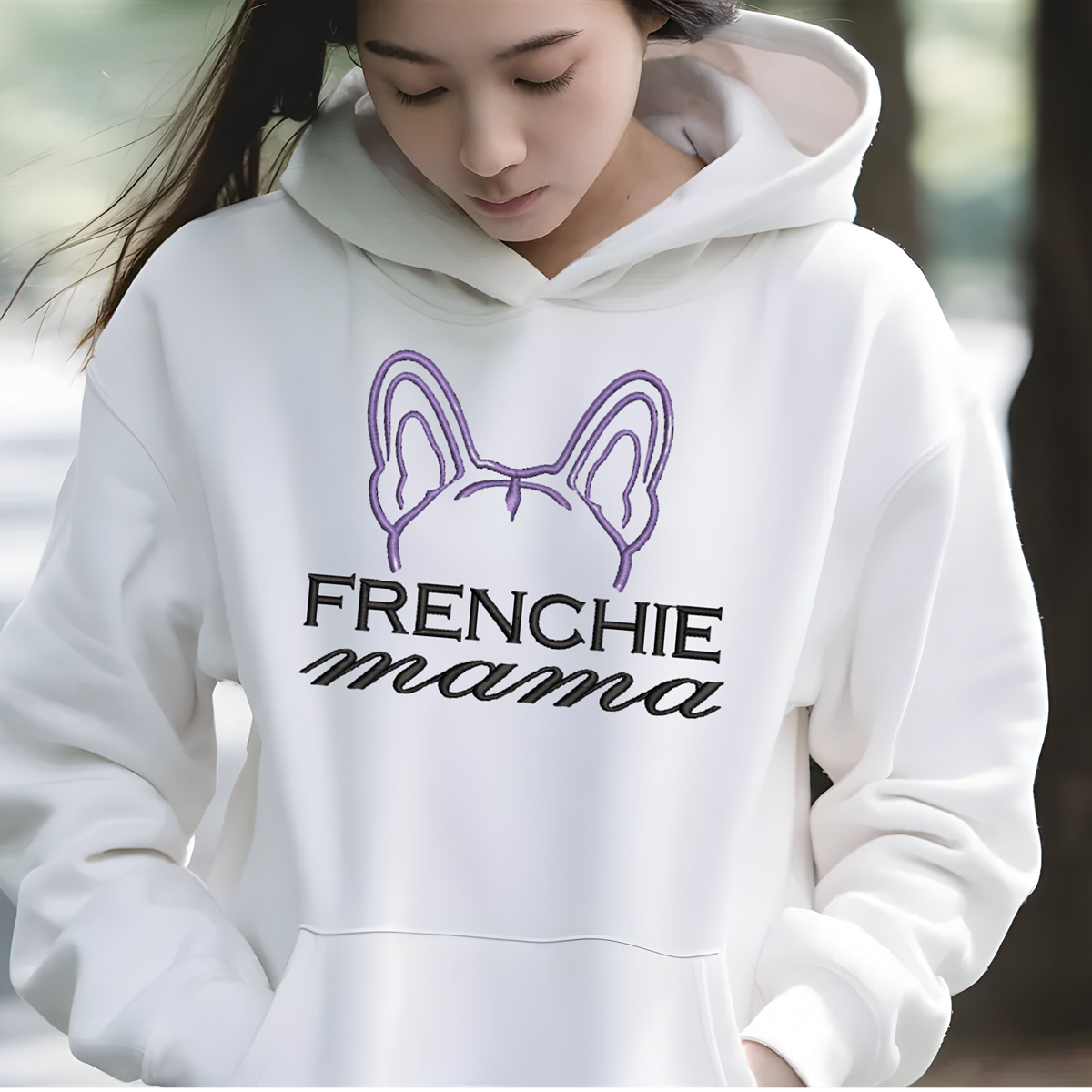 image of white hoodie with embroidered "Frenchie Mamma" on it
